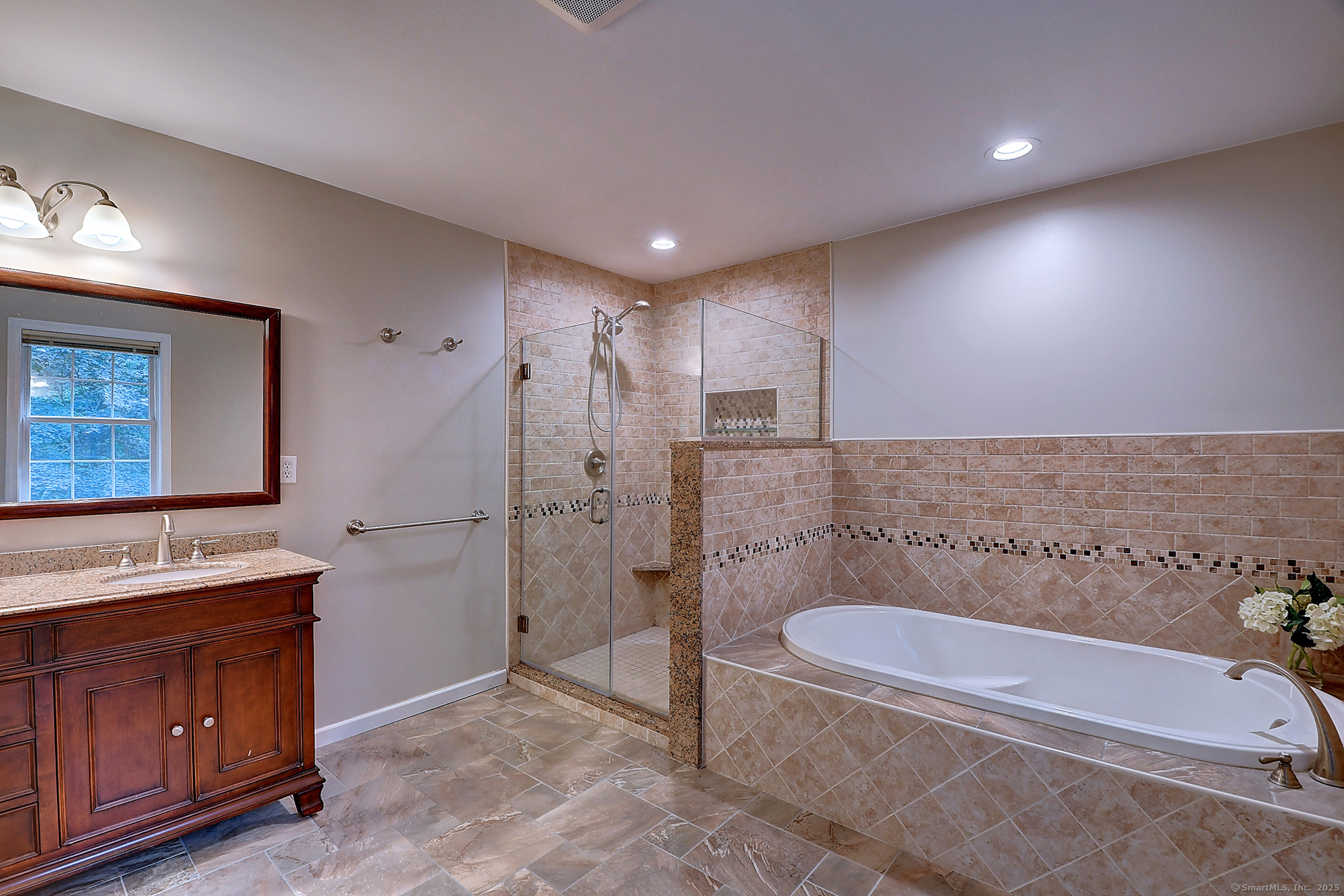 884 Moss Farms Road Cheshire, CT 06410 - Photo 24 of 39 a bathroom with a tub a toilet and a sink