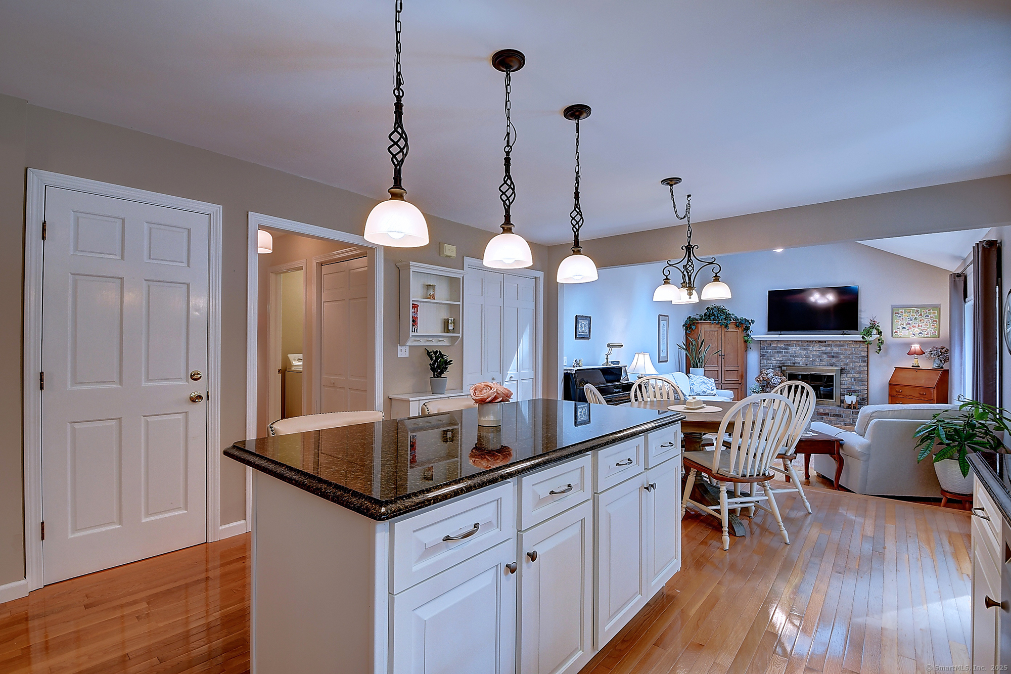 884 Moss Farms Road Cheshire, CT 06410 - Photo 10 of 39 a kitchen with granite countertop a sink a counter space appliances and cabinets