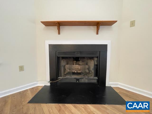 274 Larkspur Road Ruckersville, VA 22968 - Photo 9 of 27 a living room with a fireplace