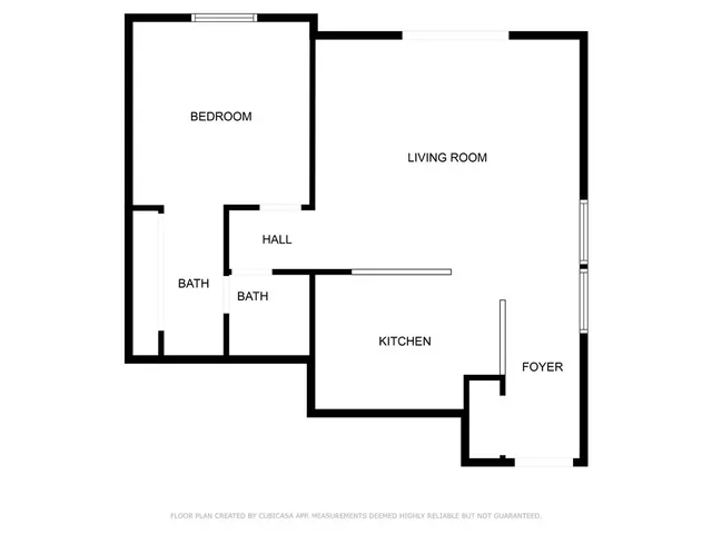 a bathroom with a toilet and a bathtub