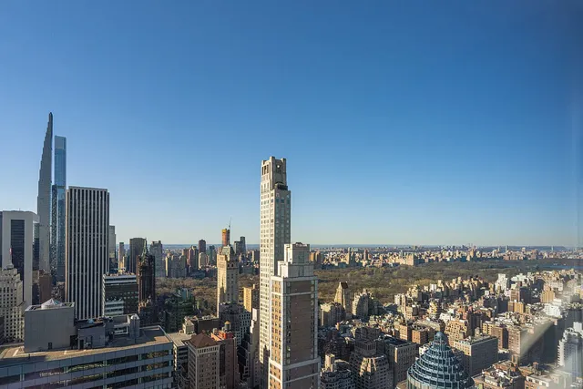 a view of a city with tall buildings