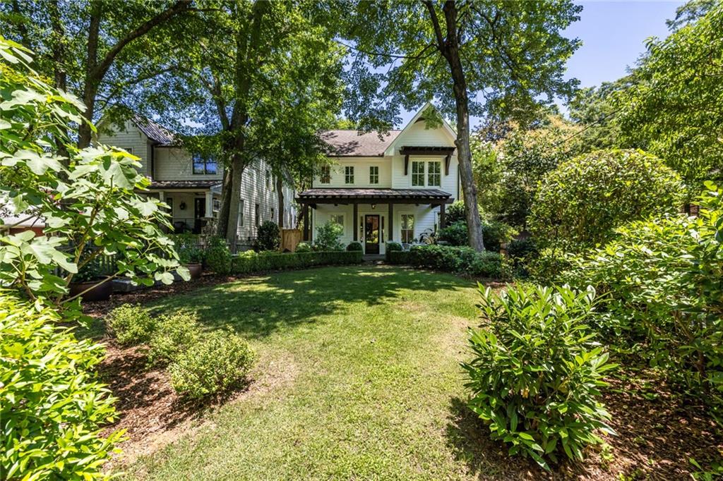 538 Ansley Street Decatur, GA 30030 - Photo 60 of 73 a front view of a house with garden
