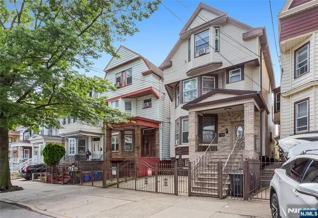 a front view of multiple houses