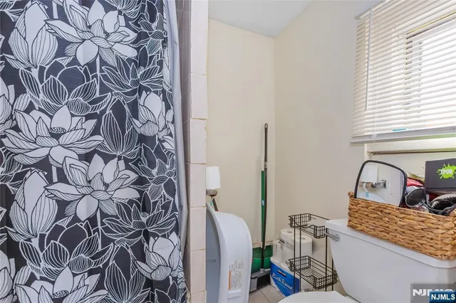 a room with a sink and a mirror