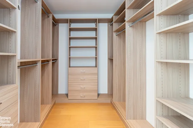 a bathroom with a tub sink double and mirror