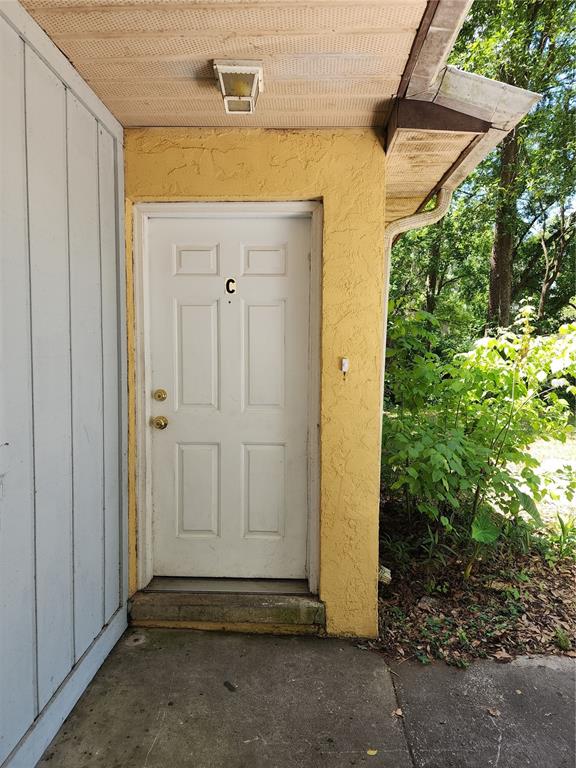 4021 Southwest 37 Street, Unit C Gainesville, FL 32608 - Photo 6 of 25 a view of door