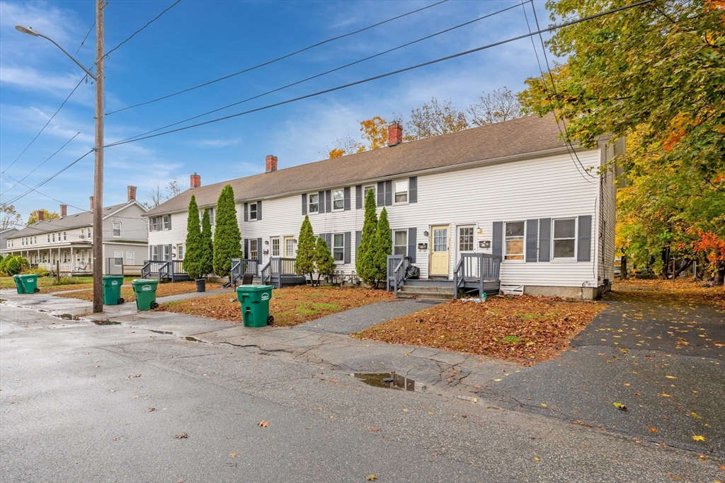14-24 C Street, Unit 14 Northbridge, MA 01588 - Photo 1 of 13 a view of a house with backyard and sitting area
