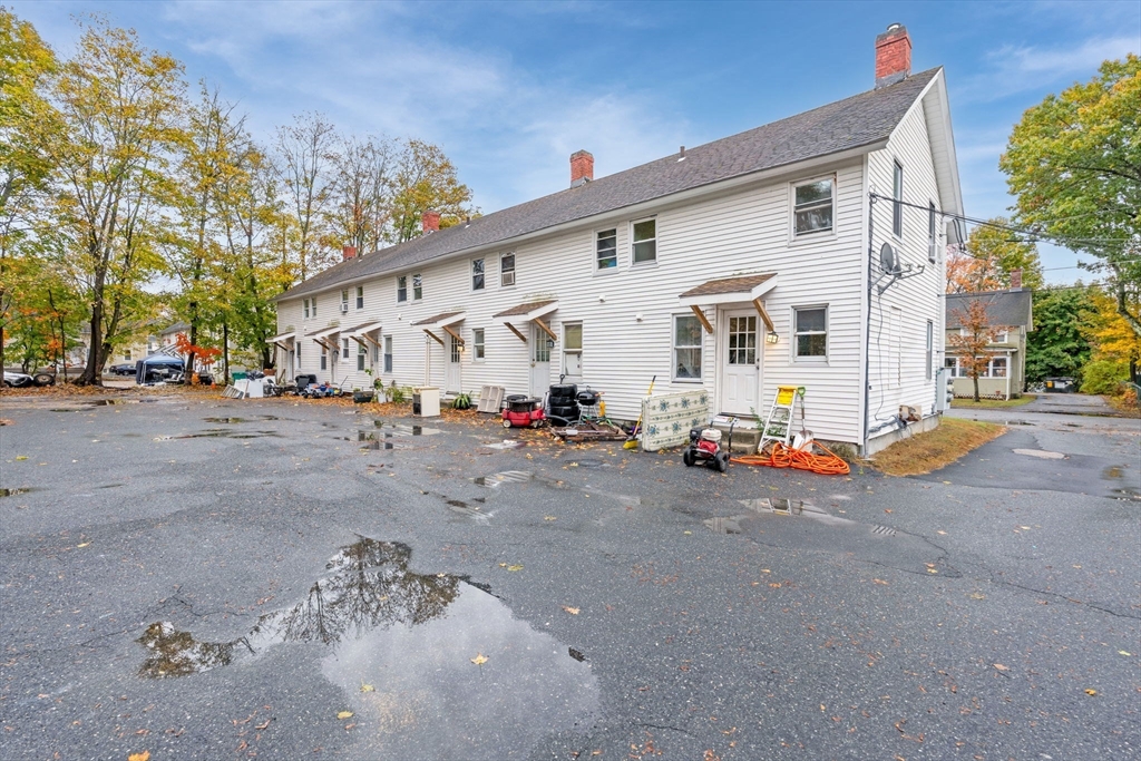 14-24 C Street, Unit 14 Northbridge, MA 01588 - Photo 2 of 13 a view of a street with cars