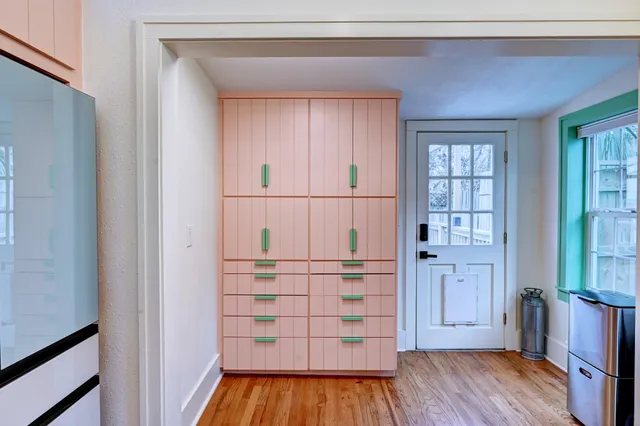 a kitchen with stainless steel appliances a stove and a refrigerator