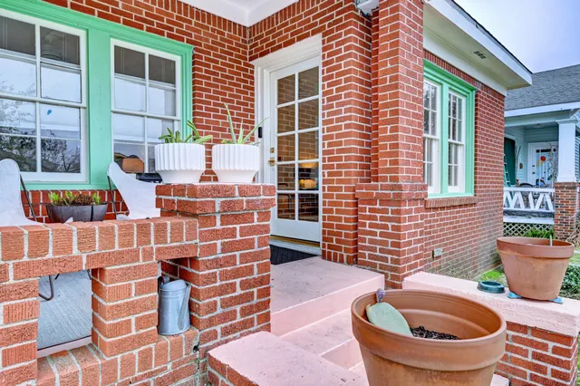 a living room with furniture or wooden floor and a window