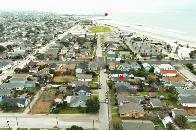 a swimming pool with outdoor seating and yard