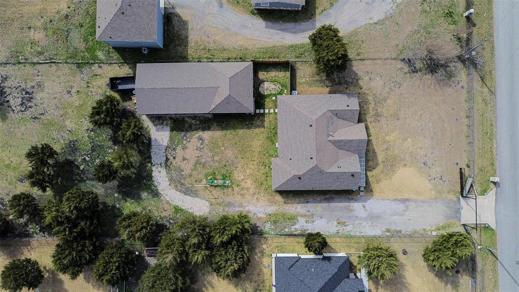 559 Northstar Road Fate, TX 75189 - Photo 5 of 32 an aerial view of a house with garden space and a car park