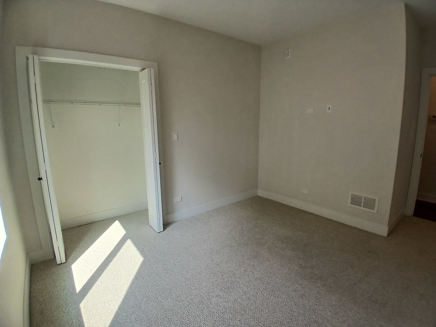 4608 South Indiana Avenue, Unit 1 Chicago, IL 60653 - Photo 11 of 24 an empty room with windows
