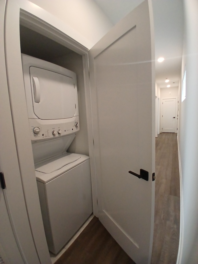 4608 South Indiana Avenue, Unit 1 Chicago, IL 60653 - Photo 15 of 24 a utility room with dryer and washer
