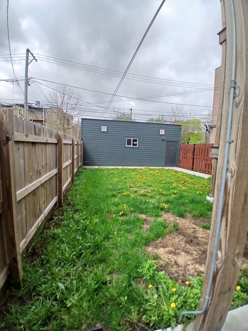 4608 South Indiana Avenue, Unit 1 Chicago, IL 60653 - Photo 24 of 24 a view of a backyard