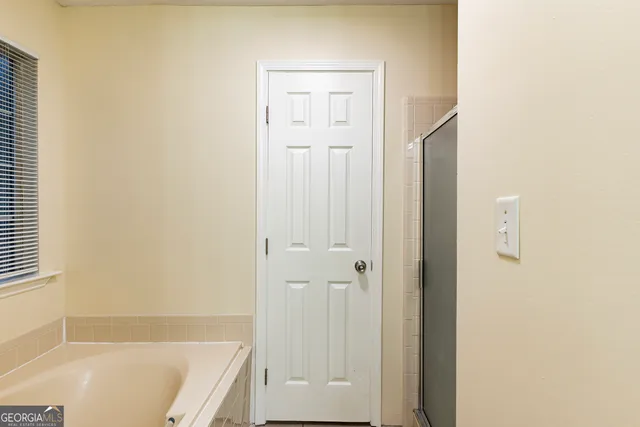 a bathroom with a sink and a bathtub