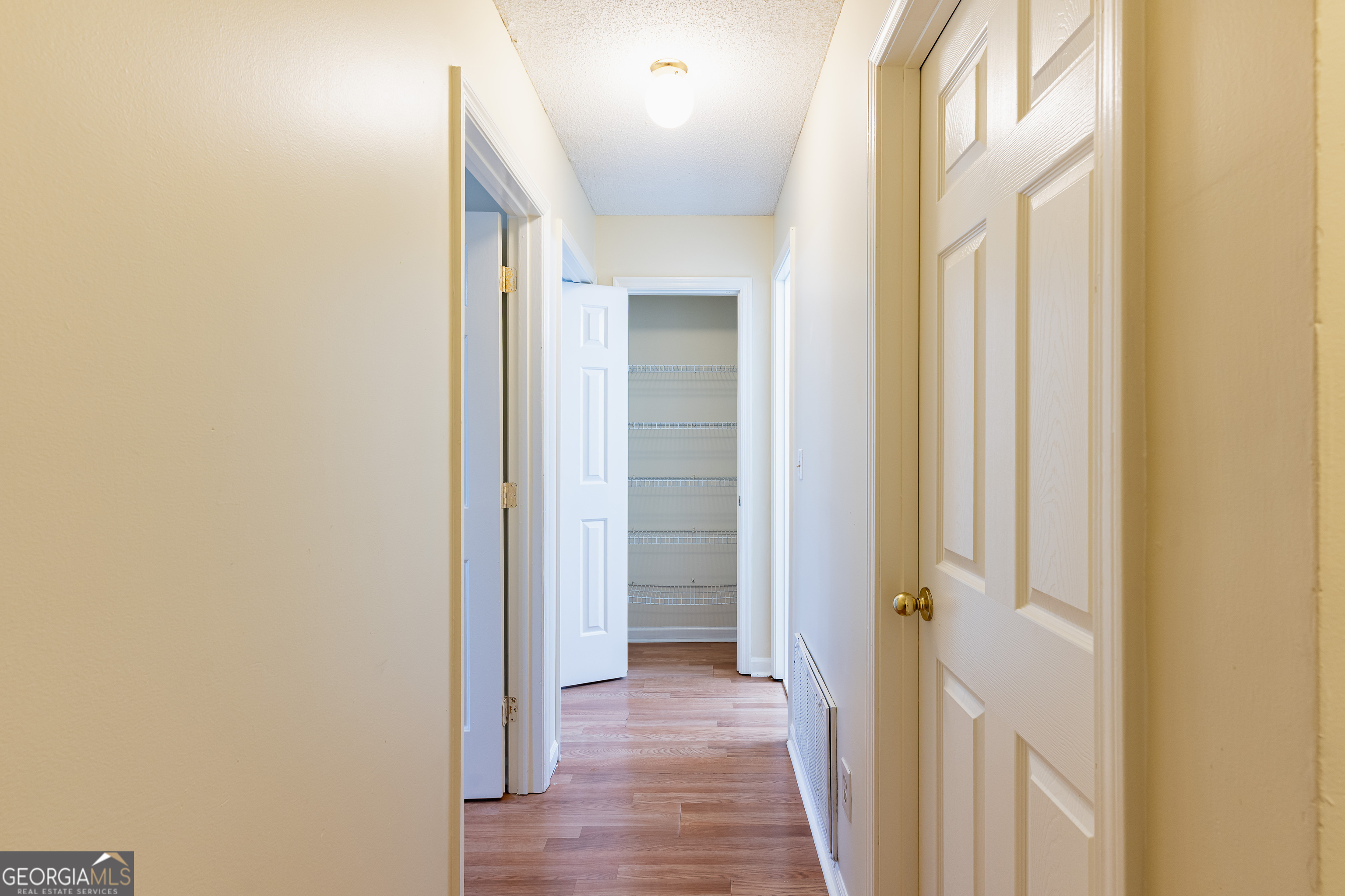 3821 Rex Mill Square Rex, GA 30273 - Photo 19 of 68 a view of a hallway with wooden floor