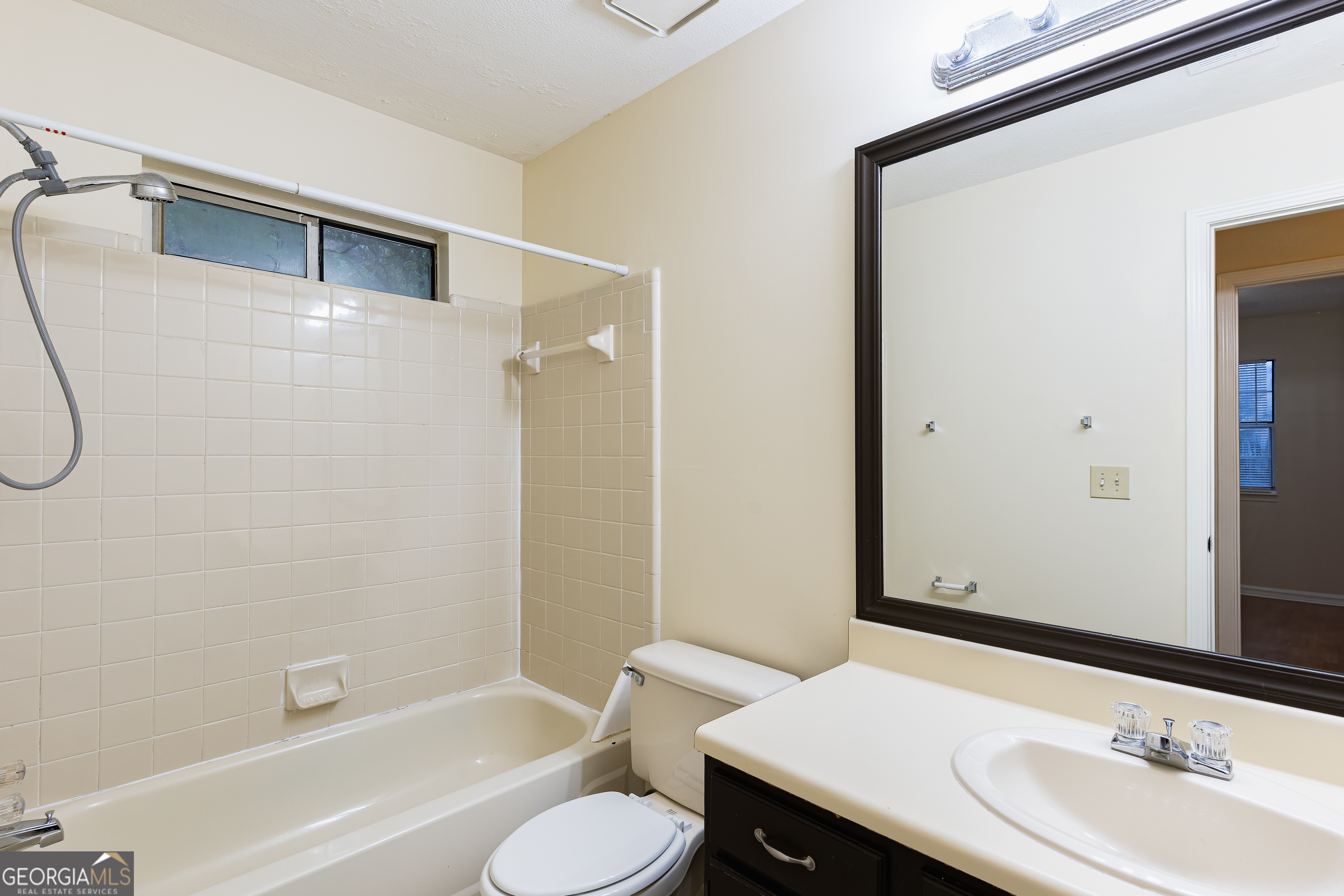 3821 Rex Mill Square Rex, GA 30273 - Photo 23 of 68 a bathroom with a sink and a mirror
