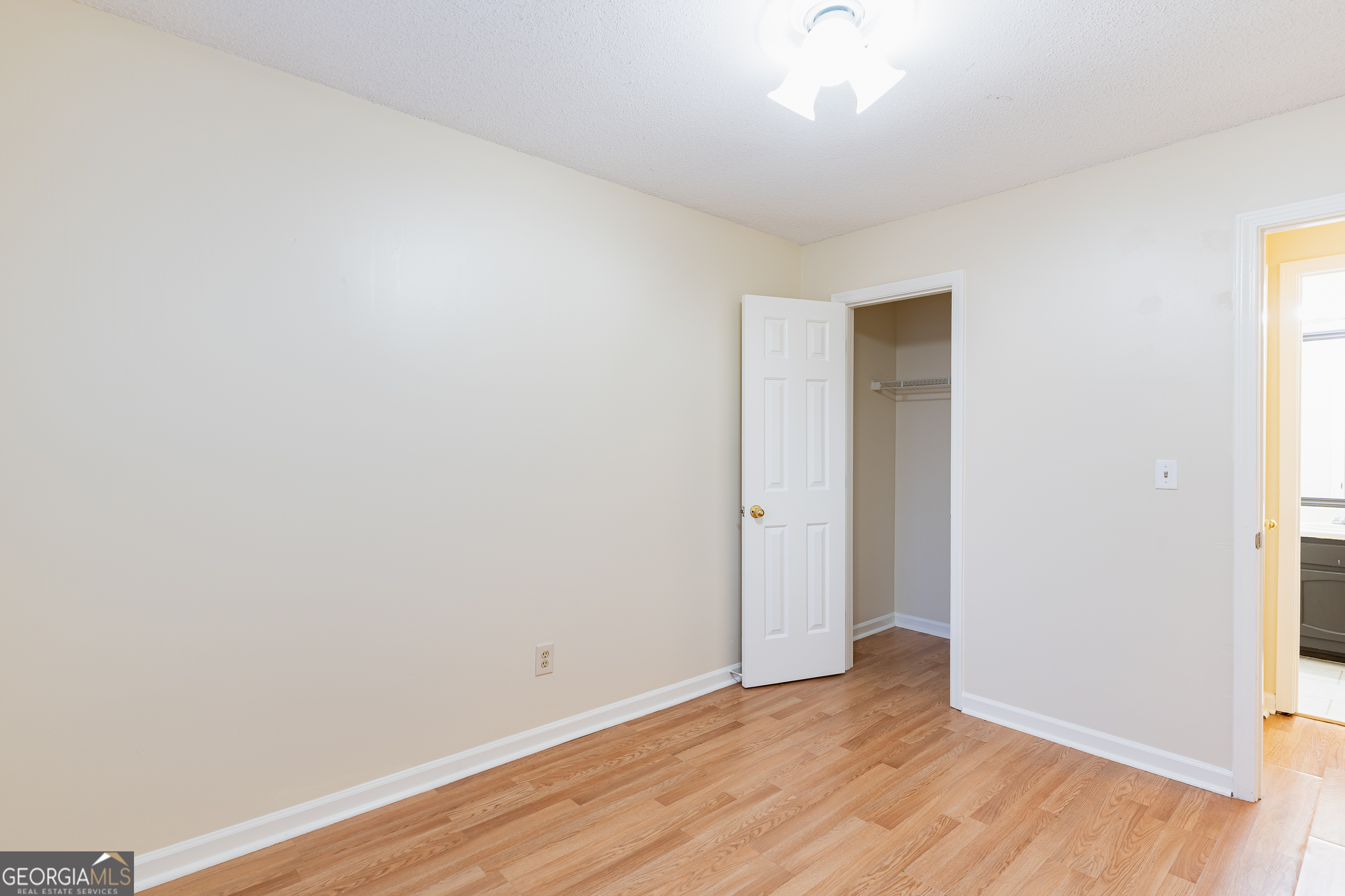 3821 Rex Mill Square Rex, GA 30273 - Photo 26 of 68 a view of an empty room with wooden floor