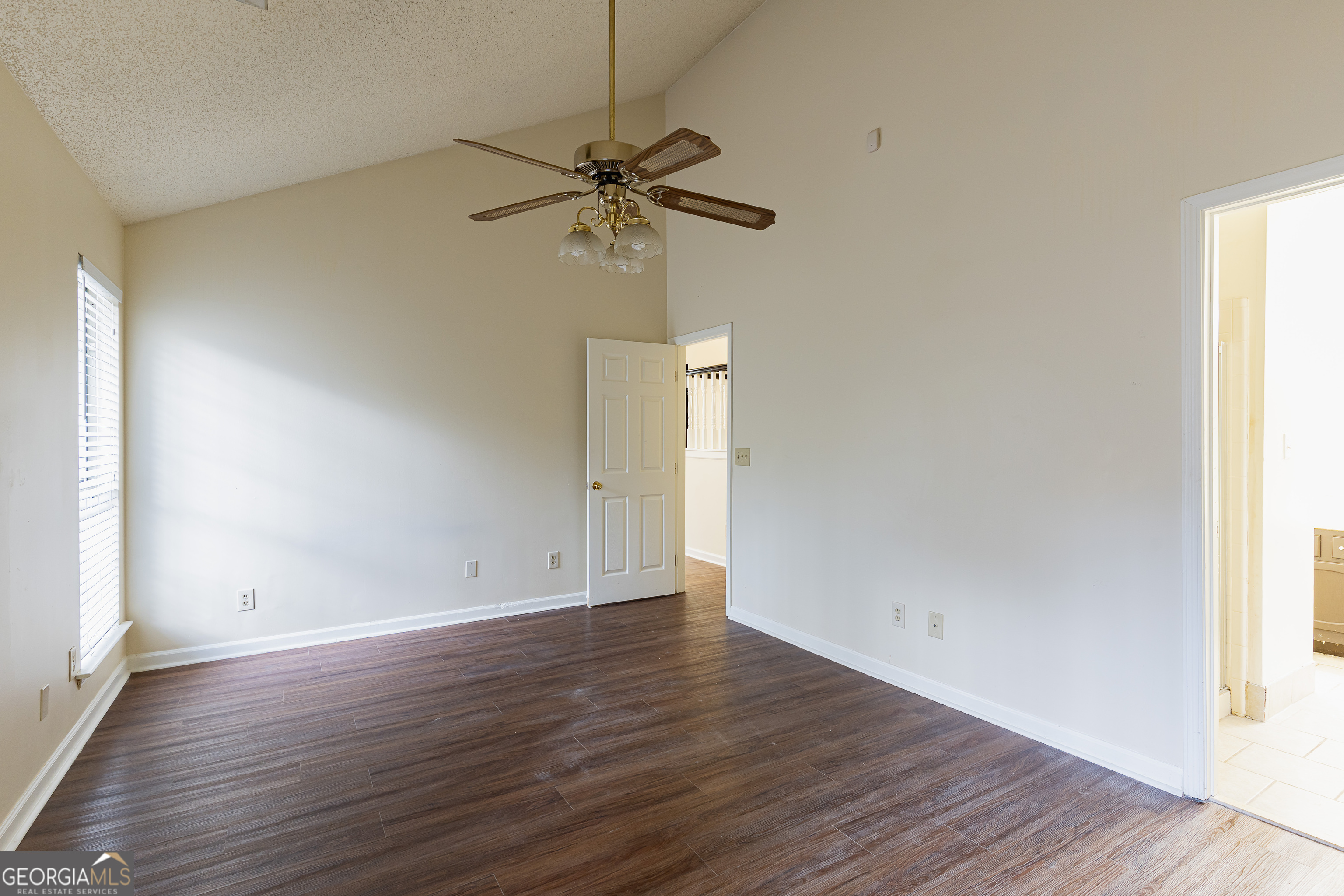 3821 Rex Mill Square Rex, GA 30273 - Photo 30 of 68 an empty room with wooden floor closet and windows