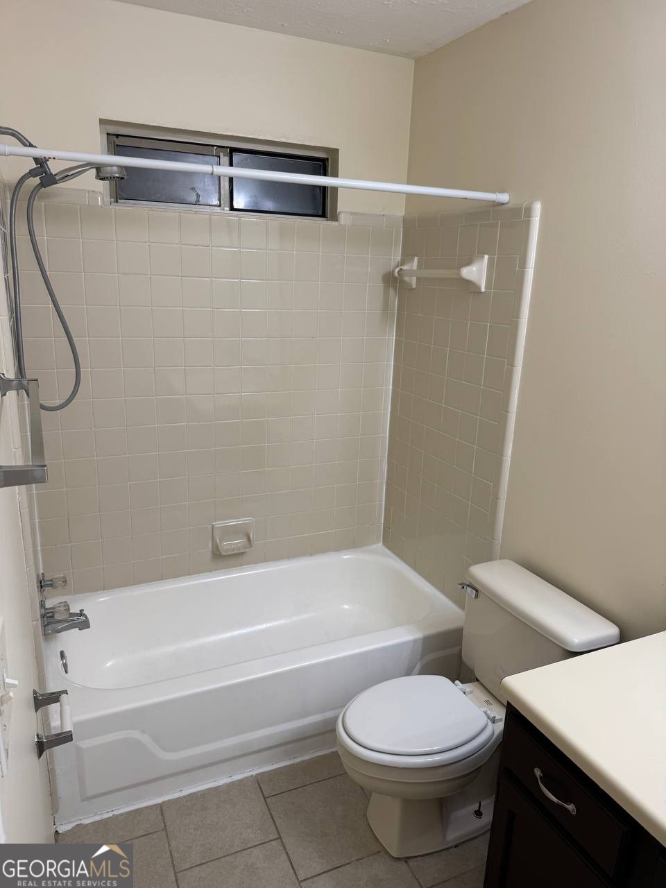 3821 Rex Mill Square Rex, GA 30273 - Photo 55 of 68 a bathroom with a toilet and a bath tub