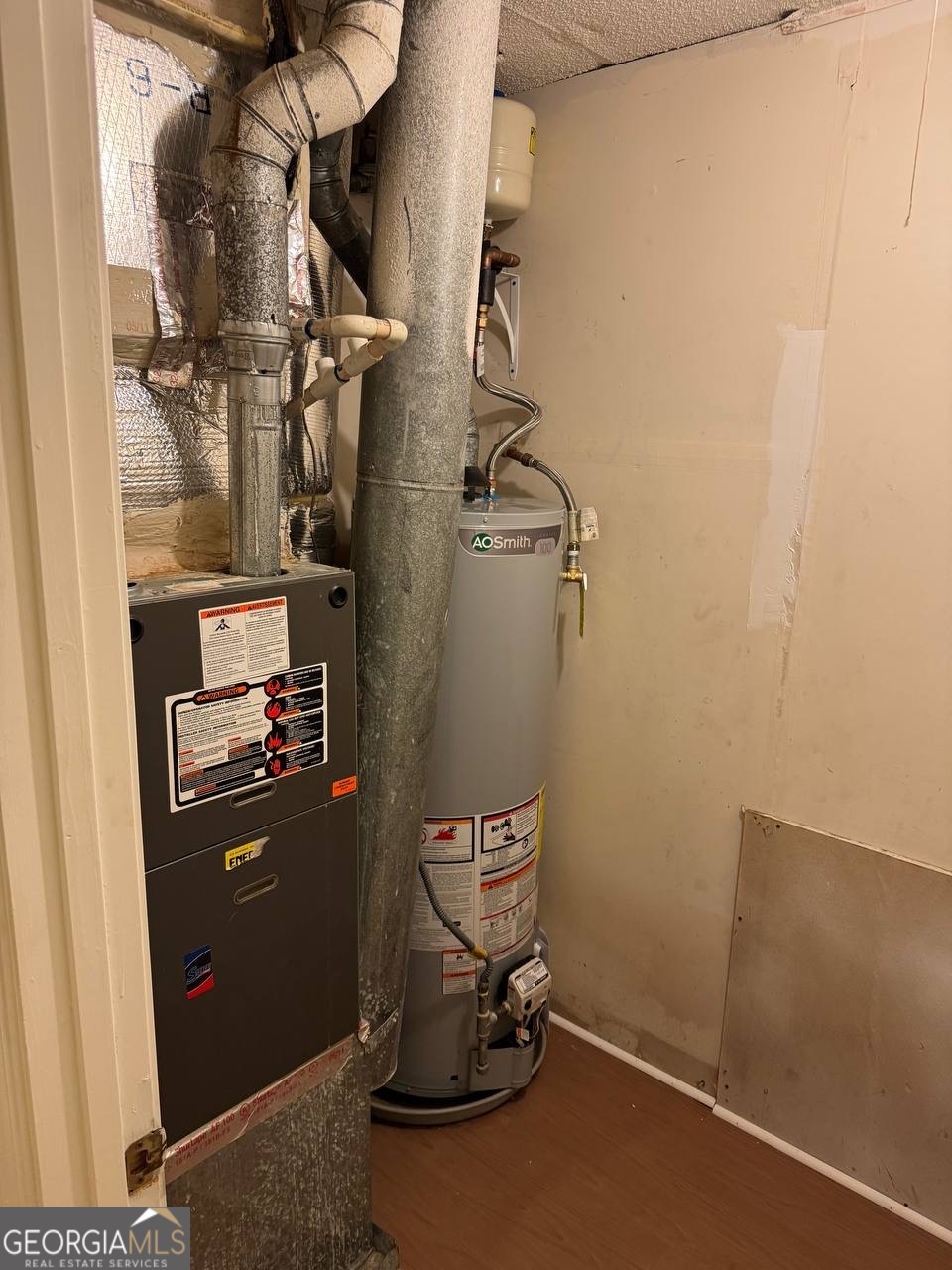 3821 Rex Mill Square Rex, GA 30273 - Photo 59 of 68 a view of storage and utility room with racks on the wall