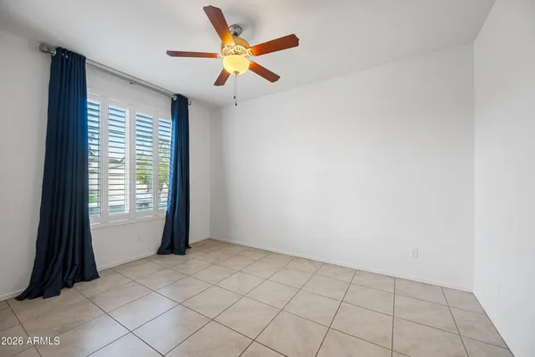 a view of an empty room and window