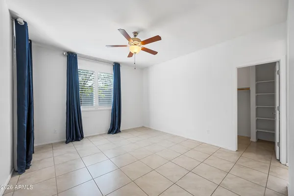a view of an empty room and window