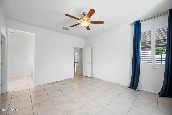 a view of an empty room and window