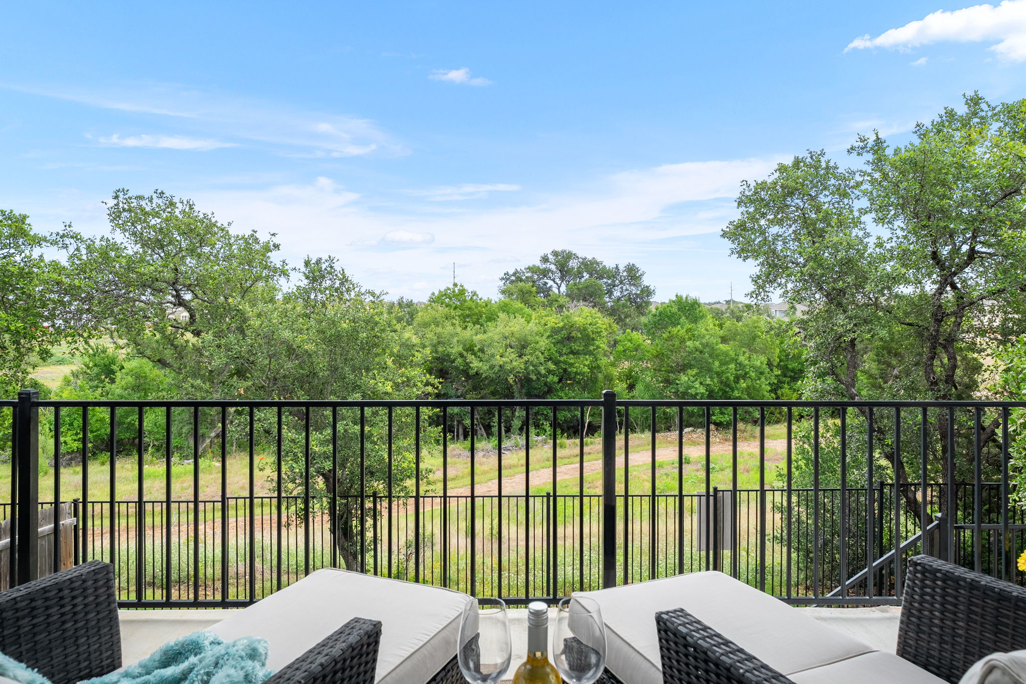 1908 Woolsey Way Leander, TX 78641 - Photo 28 of 36 Unwind on the outdoor patio, enjoying the tranquility of nature and open sky.