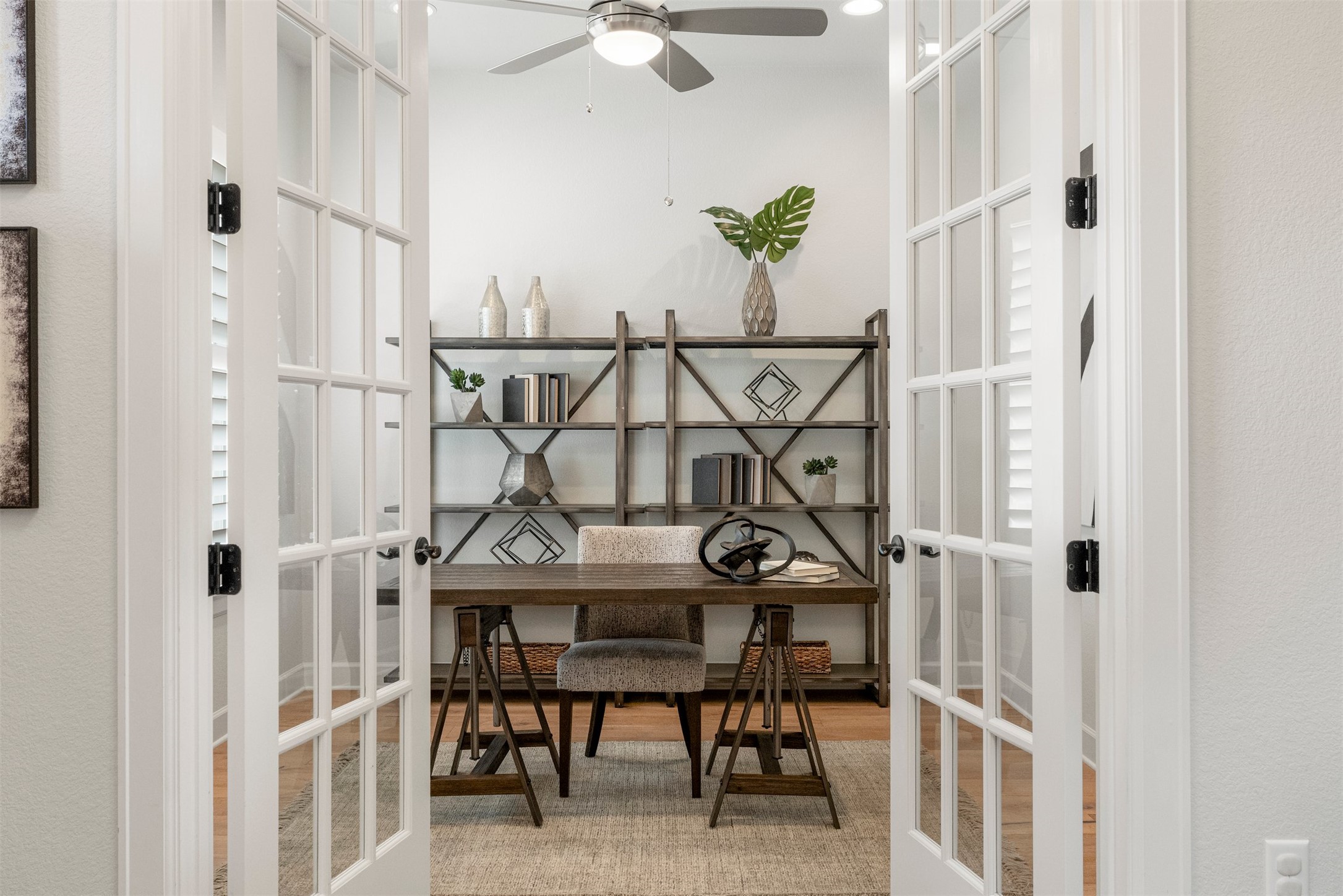 4313 Vaughan Street Austin, TX 78723 - Photo 5 of 39 Situated just off the front foyer, this dedicated office provides a quiet, productive workspace completely removed from the main living areas