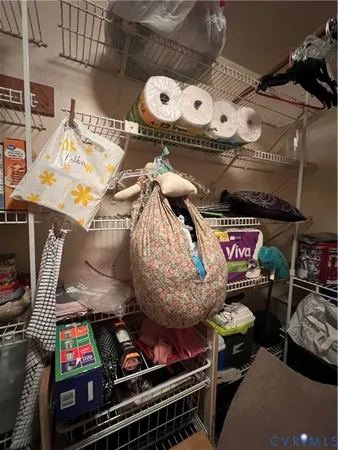 a room with lots of appliances and couch