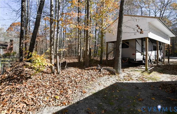 a view of a house with snow on the ground