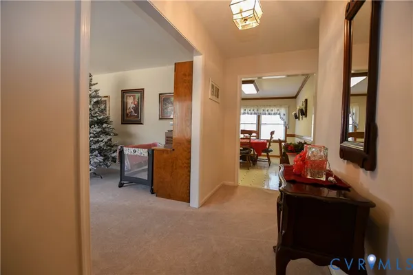 a view of a livingroom with furniture and windows
