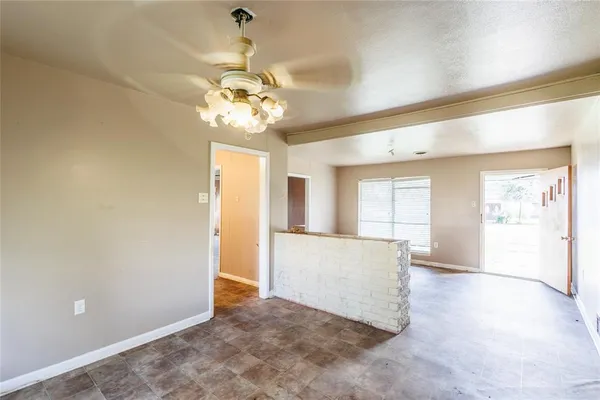 a view of a room with a large window