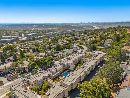 an aerial view of city and lake