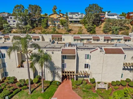 a large building with a clock tower in middle of it