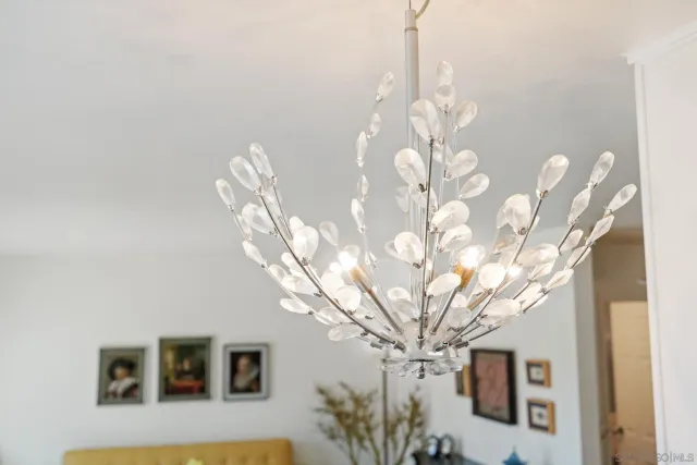 a very nice looking room with a large tree