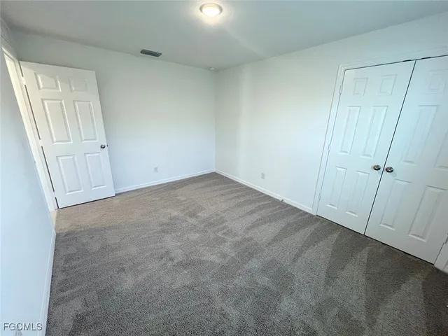 an empty room with a door