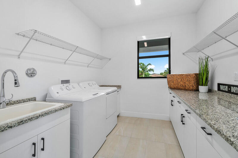 8808 Quiet Inlet Lane Boca Raton, FL 33496 - Photo 32 of 50 Upstairs Laundry ROom