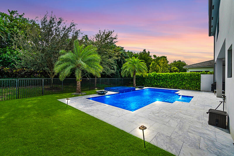 8808 Quiet Inlet Lane Boca Raton, FL 33496 - Photo 36 of 50 Lotus Backyard at Dusk