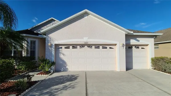 a view of a house with a garage