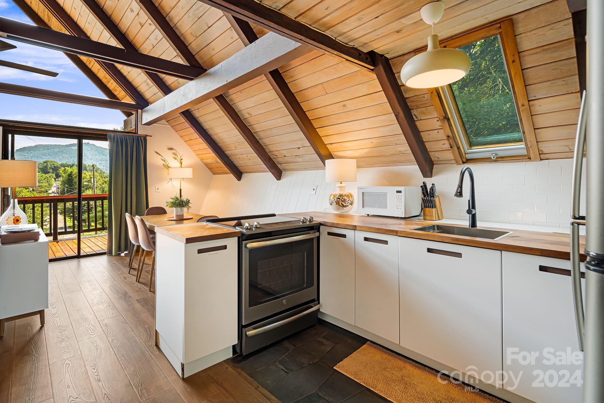 161 Spencer Street Clyde, NC 28721 - Photo 15 of 41 a utility room with dryer and washer