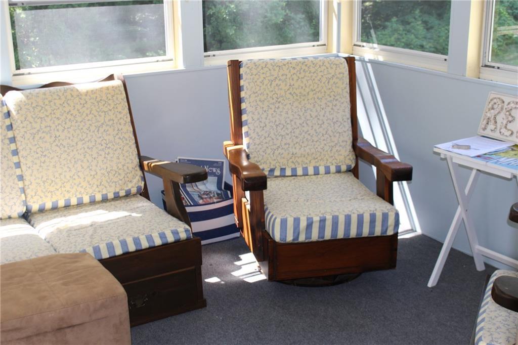 86 Flintlock Village Road, Unit 2 Wells, ME 04090 - Photo 17 of 28 With plenty of room, there's seating...