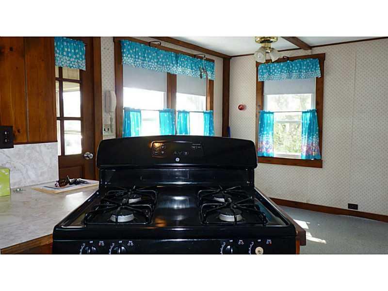 258 Forrest Edwards Road Otisfield, ME 04270 - Photo 18 of 21 Kitchen. dining area new stove