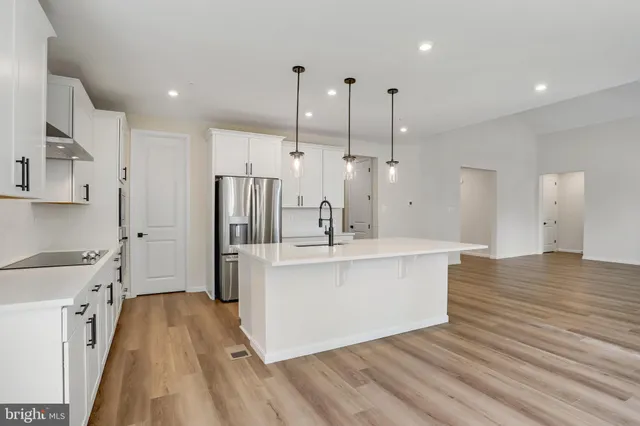 a bathroom with a sink and vanity
