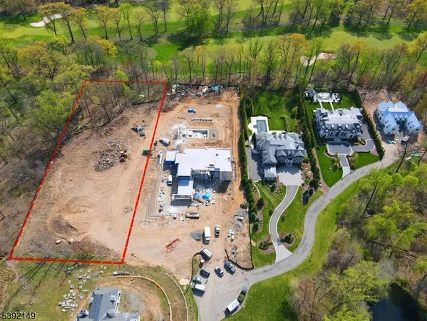 a aerial view of residential houses with outdoor space