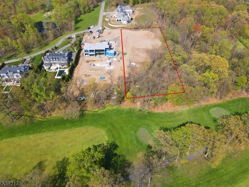 6 Frick Drive Alpine, NJ 07620 - Photo 4 of 6 a aerial view of residential houses with outdoor space