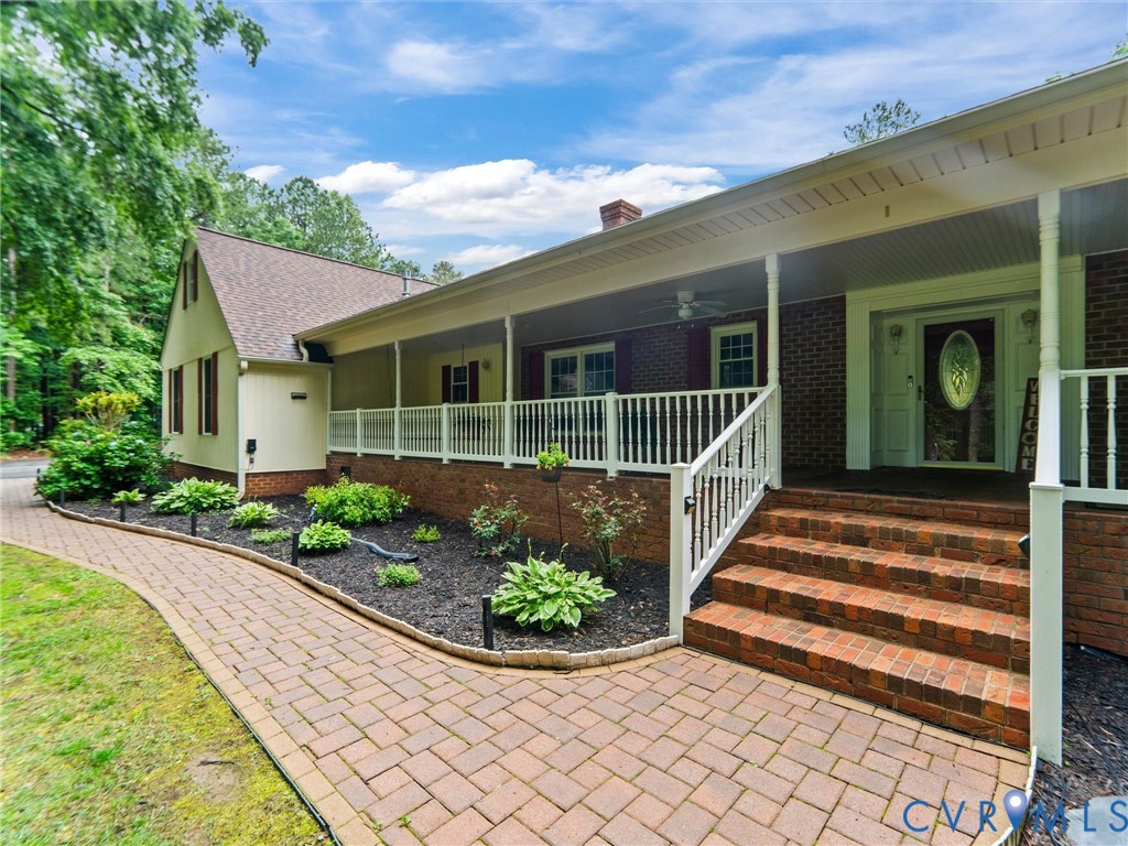 3420 State Rte 656 Powhatan, VA 23139 - Photo 1 of 37 a front view of a house with a garden
