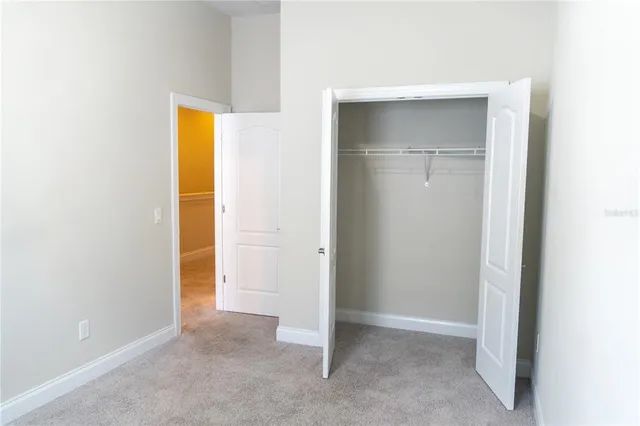 a bathroom with a shower and a sink